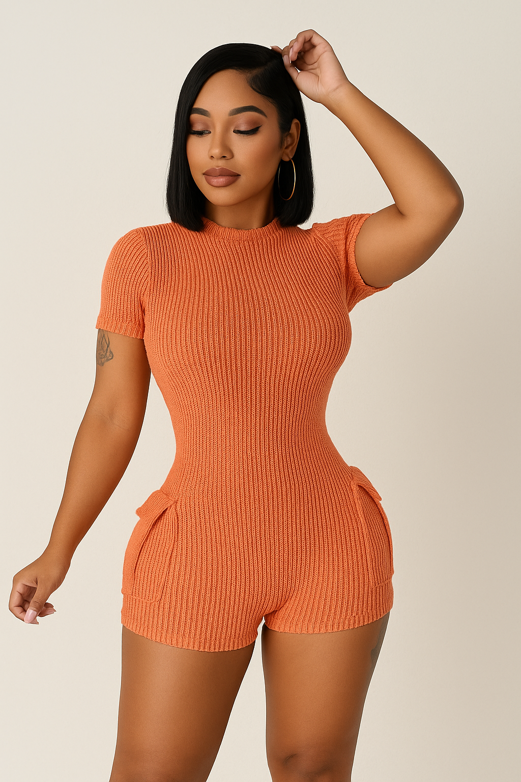 “Snatched & Sleek Ribbed Open-Back Romper”